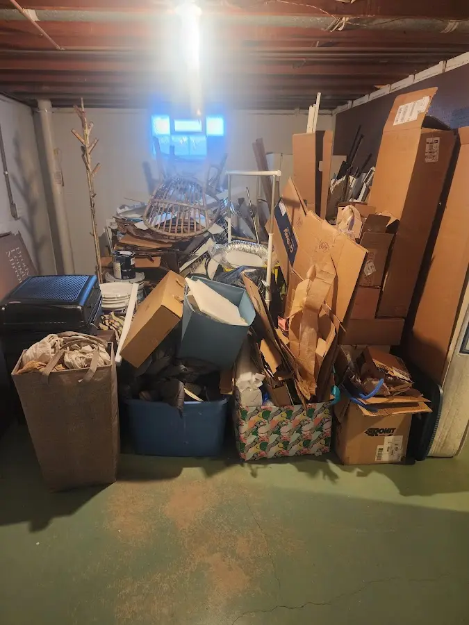 Roll-off dumpster container at job site for 4 Yard Dumpster Rental in South Fulton